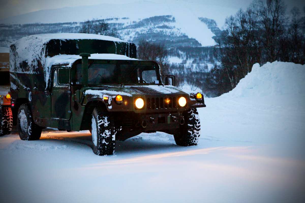 U.S. Marines with Kilo Company, 3rd Battalion, 24th Marine Regiment, 4th Marine Division wait in a Humvee prior to a transport convoy at the Allied Training Center in Harstad, Norway, March 12, 2012, during exercise Cold Response 2012. The midnight convoy was en route to one of Harstad's beaches. Cold Response is a Norwegian-led exercise to rehearse high-intensity operations in winter conditions. Participants are from 15 NATO nations with the largest group of participants coming from Canada, France, the Netherlands, Great Britain, Sweden and the United States. 
