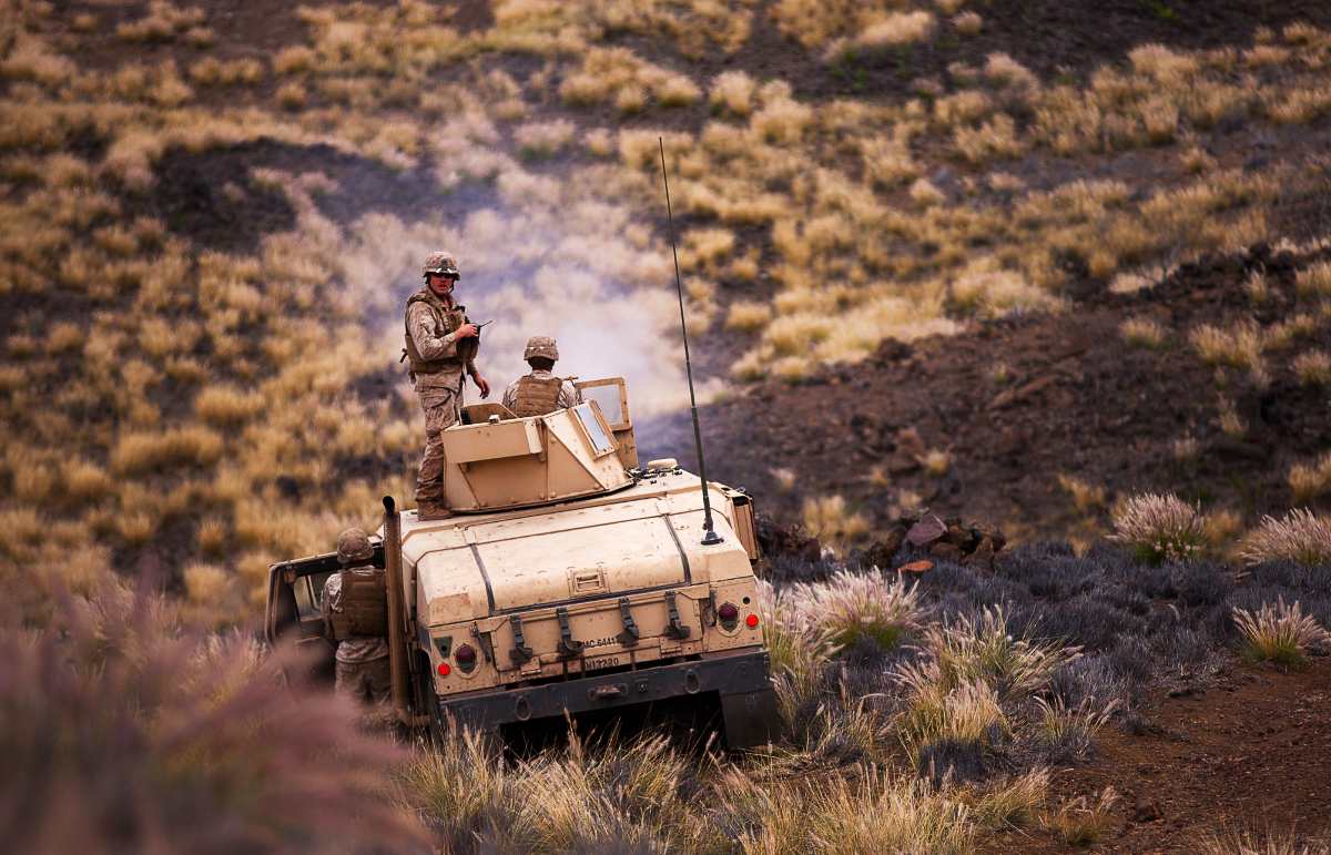 Marines with Combined Anti-Armor Team 1 Bravo, Weapons Company, 2nd Battalion, 3rd Marine Regiment send .50 caliber machine gun fire down range in a support by fire position at Pohakuloa Training Area, Big Island of Hawaii, July 19. The CAAT section was supporting Echo Co.’s mechanized company-level live-fire assault with suppressive fire as part of Exercise Lava Viper. Lava Viper is a battalion-level combined-arms exercise designed to enhance the capabilities of ground combat and support element Marines participating. 