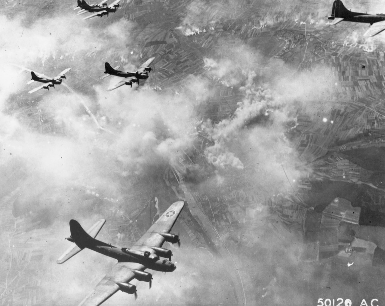 B-17 Flying Fortress bombers in tight formation during a daylight bombing mission over Europe